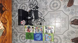 Xbox avec programmes et CD, presque neuf