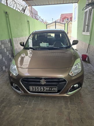 Location Suzuki Dzire 2023, essence, boîte automatique, état neuf