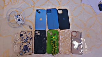iPhone 14 Bleu Ciel avec accessoires, état impeccable