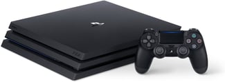 Console PS4 Pro en très bon état avec jeux inclus