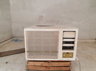 Climatiseur fenêtre Super Général 1,5 CV en bon état