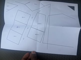 Terrain 500 m2 double façade avec titre provisoire à Arta