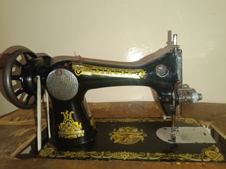 Machine à coudre Singer d'occasion en bon état