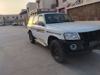 Nissan Patrol Y61 2010 diesel 4x4 boîte manuelle blanc