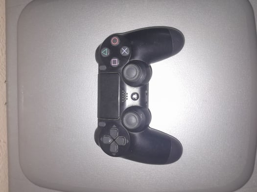 Manette Ps4 en excellent état, fonctionnelle