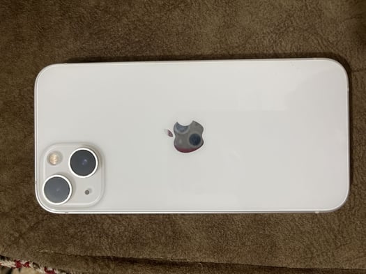 iPhone 13 Blanc en très bon état