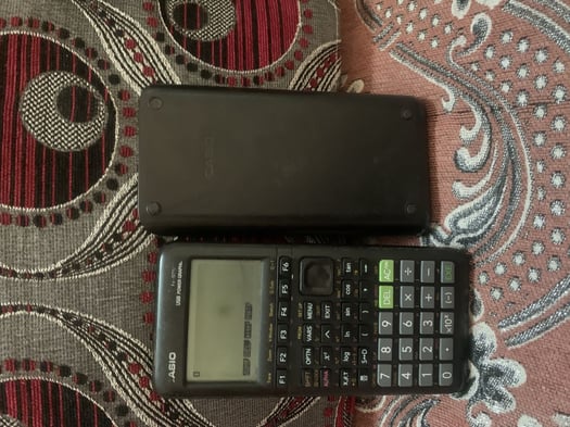 Calculatrice scientifique graphique ASIQ fx-975P en parfait état