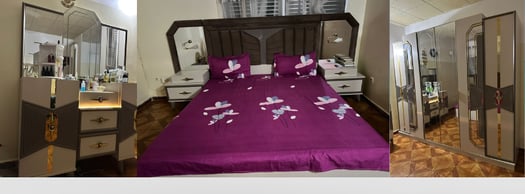 Chambre à coucher moderne avec lit, armoire et table de rangement