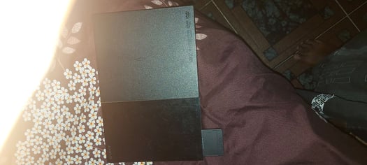 Playstation 2 en excellent état, prix négociable