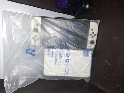 Nintendo Switch OLED comme neuf