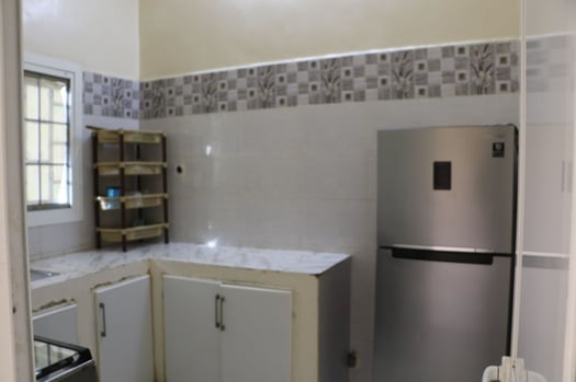 Immeuble R+2 avec 6 appartements, quartier calme et accessible