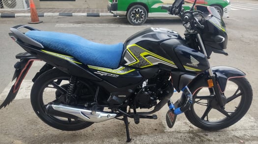 Honda SP125 125 cm3, comme neuve, économique et fiable