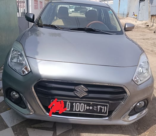 Suzuki Dzire gris, essence, boîte automatique, propre