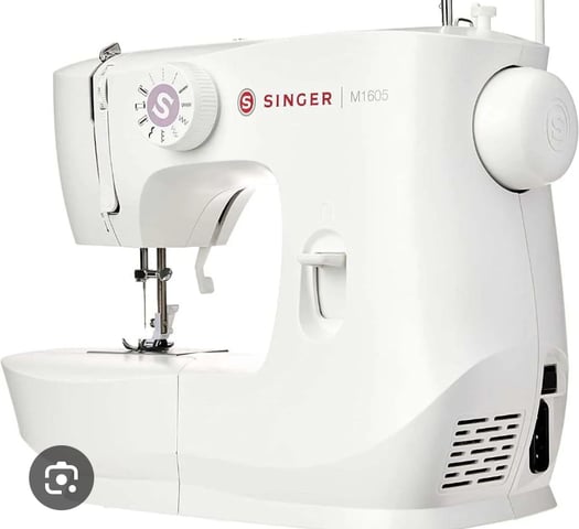 Machine à coudre électrique Singer en très bon état