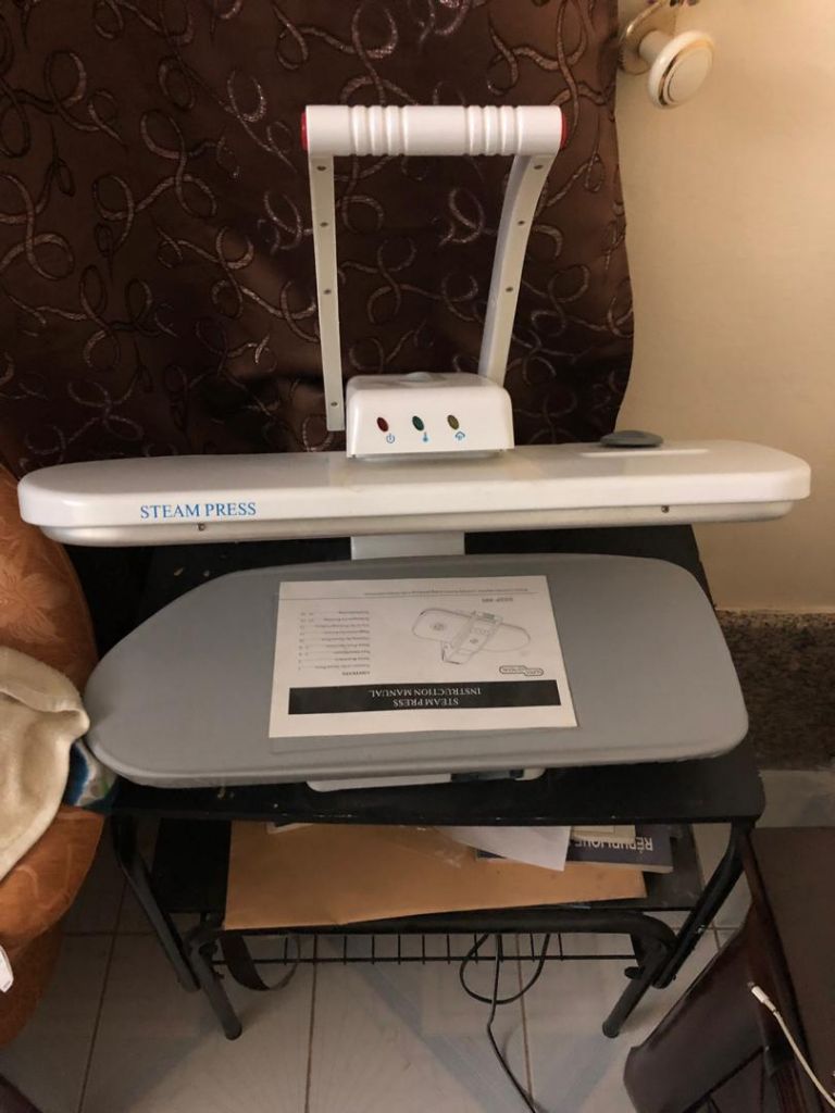 Machine a repasser électrique