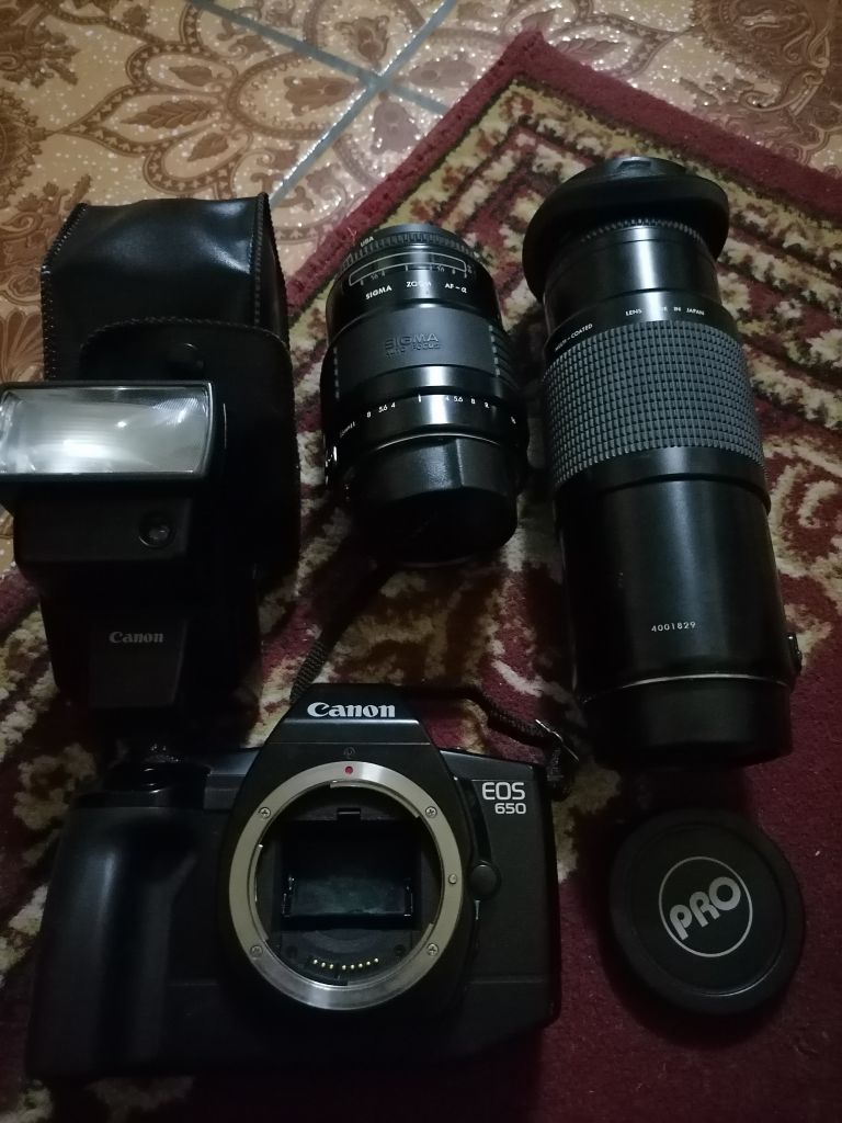 Recherche aide Canon eos 650