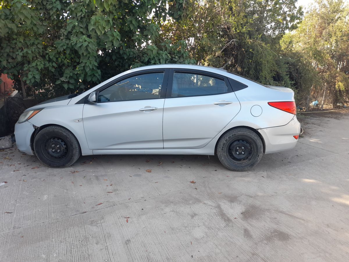 Hyundai Accent en excellent état, climatisée