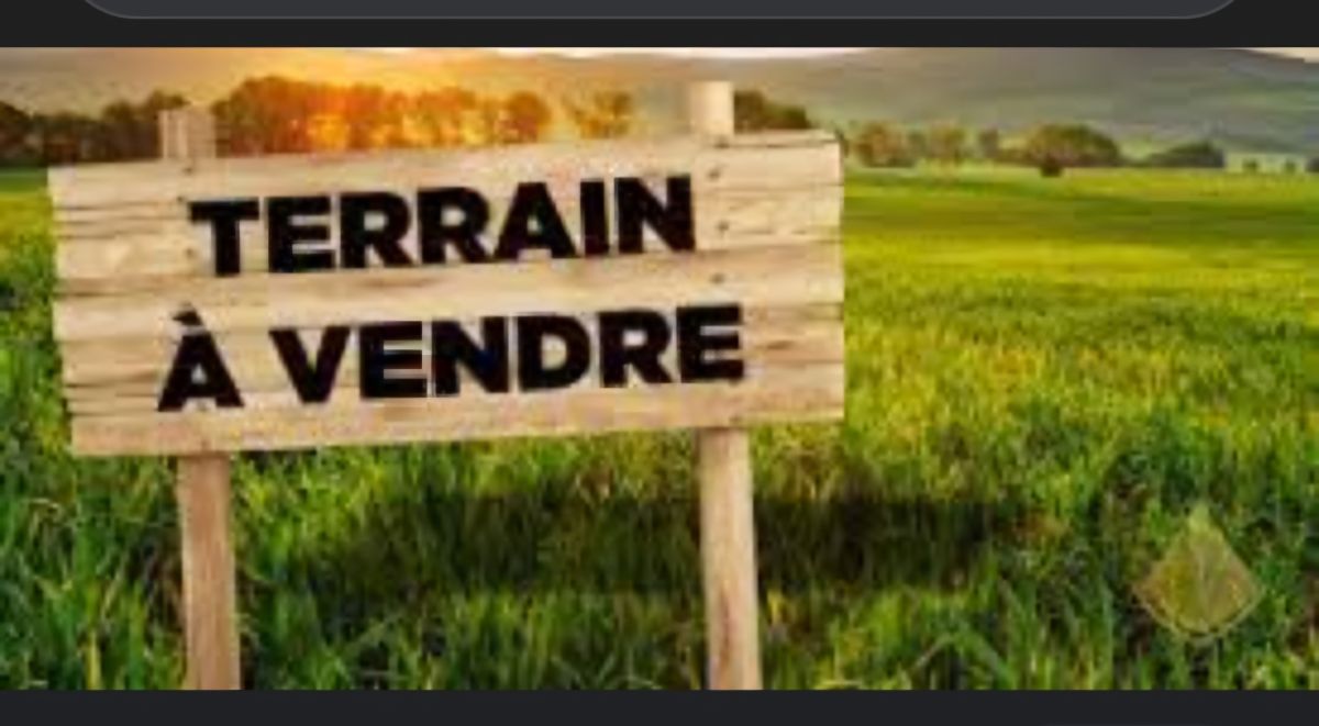 Terrain 125m² avec titre foncier sur route Nelson Mandela