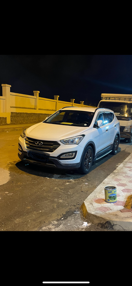 Hyundai Santa Fe 2015, Diesel, 4x4, 7 places, Auto Park, sièges en cuir, climatisation