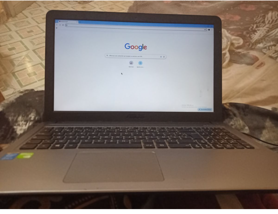 Ordinateur portable Asus en bon état - 4GB RAM - 350GB