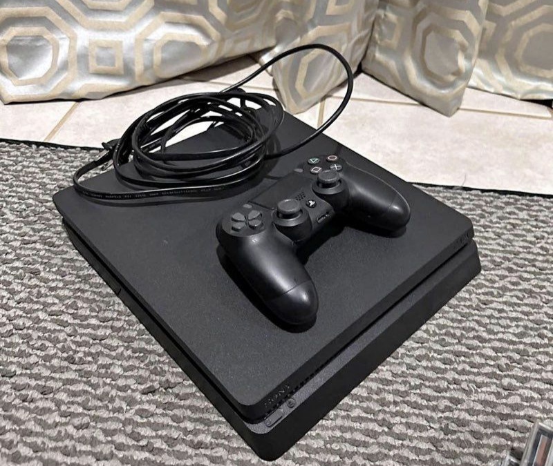 Console de jeu PS4 500 Go avec manette neuve et jeu FC25