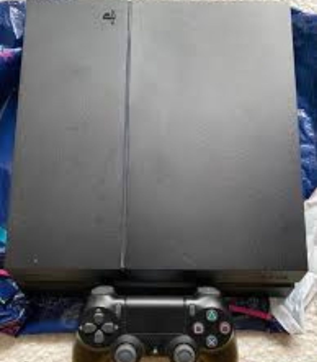 Console PS4 FAT en excellent état avec manette