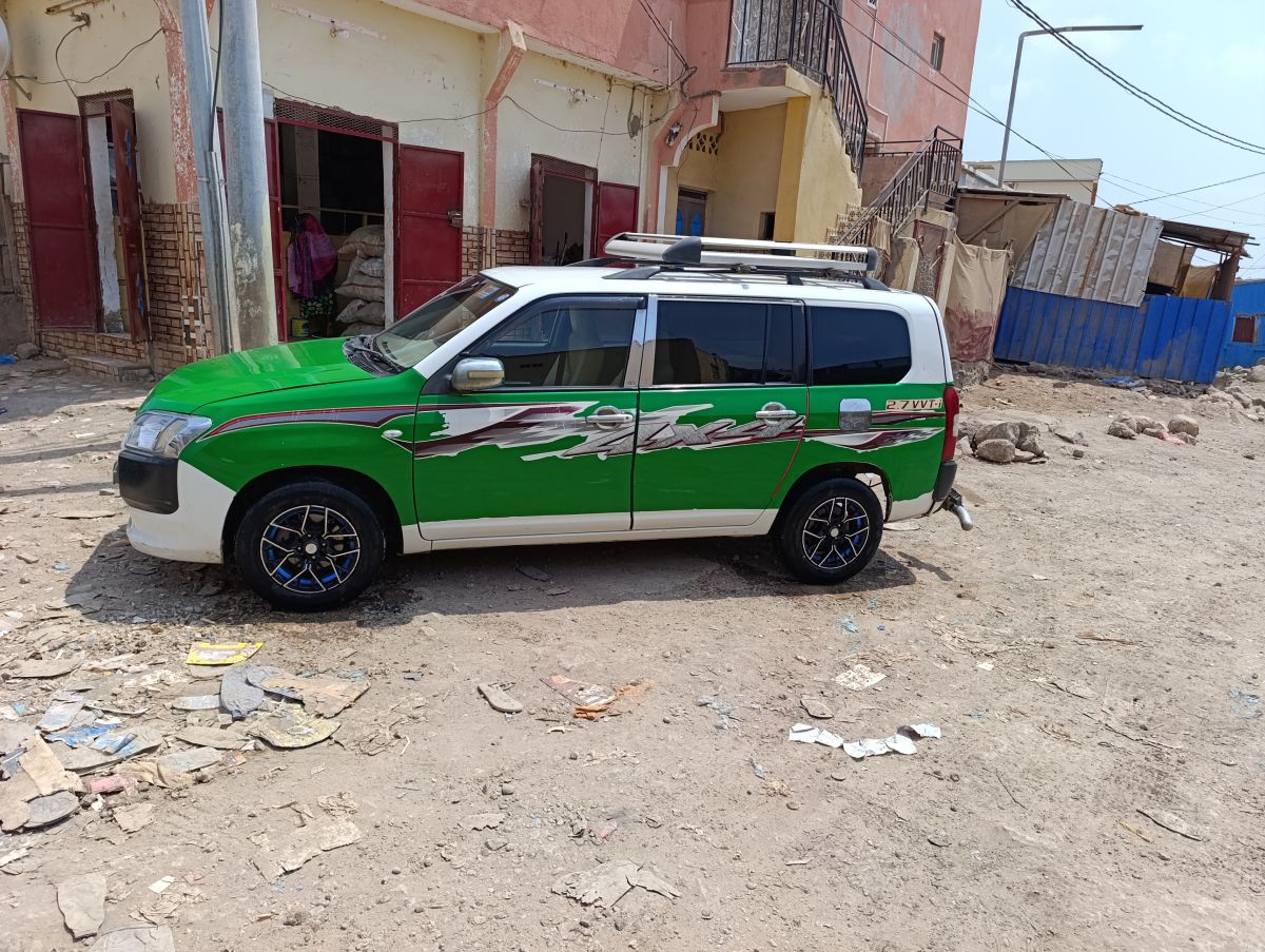 Taxi Borbox 20XX, climatisé, essence, négociable