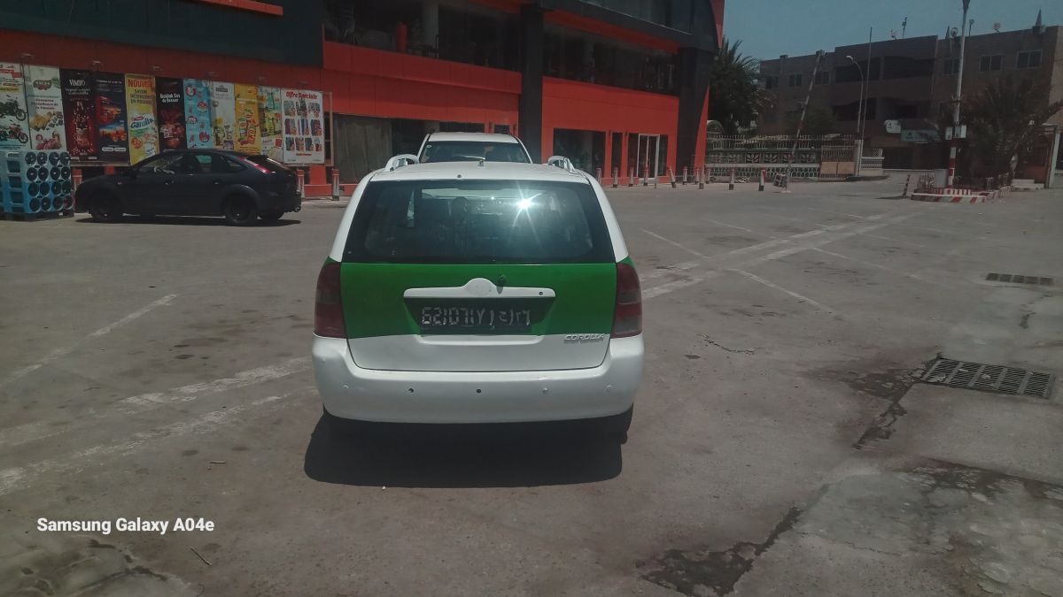 Taxi Toyota Corolla climatisé en excellent état