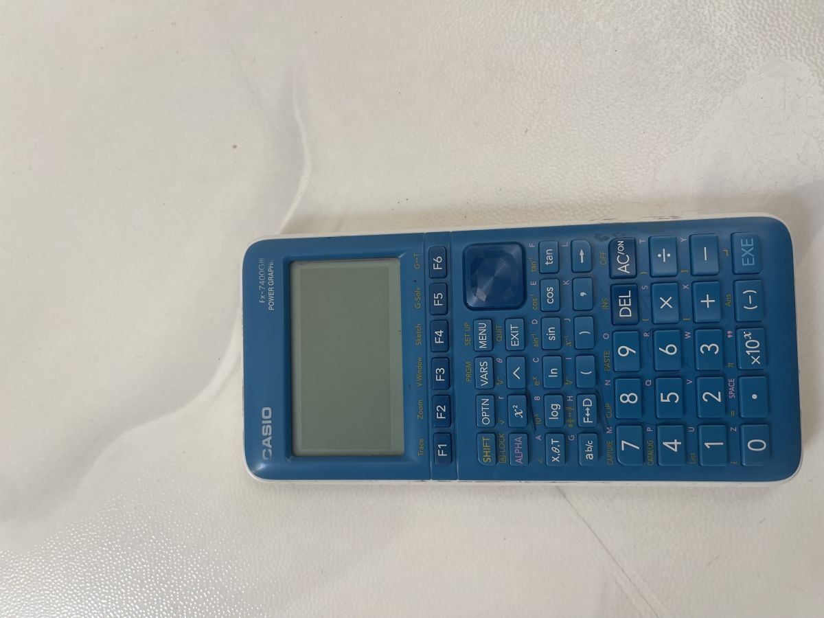 Calculatrice graphique bleu, impeccable