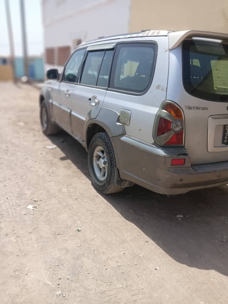 Suzuki Trican 2016, en bon état, couleur argent