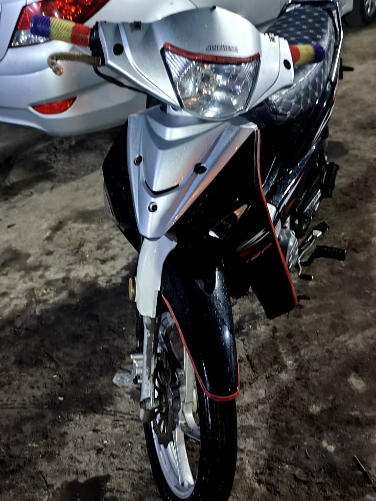 Moto 110 en excellent état, test possible avant achat