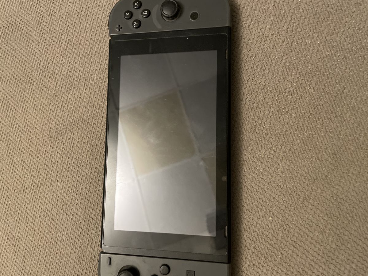 Nintendo Switch 1 avec jeux - Super Smash Bros, Dragon Ball Xenoverse 2