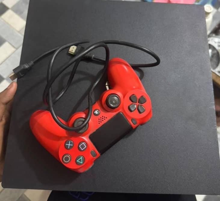 Playstation 4 Pro avec jeux GTA, course de voiture et FIFA