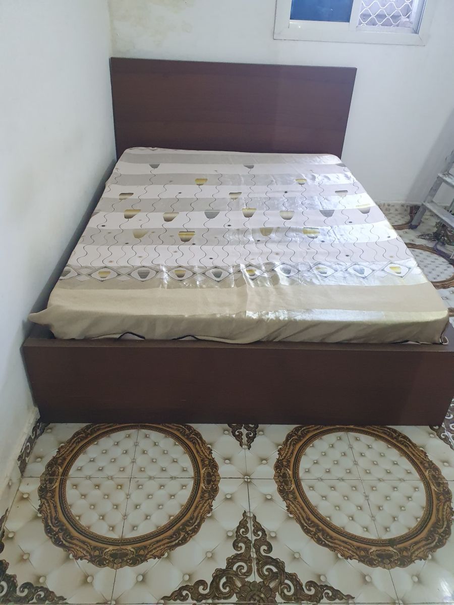 Lit 1,40m avec tiroirs en bon état