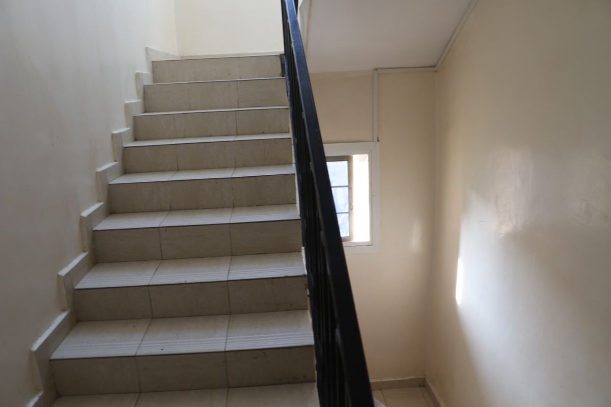 Immeuble R+2 avec 6 appartements, quartier calme et accessible