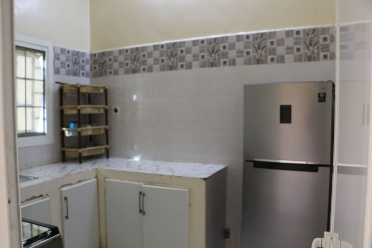 Immeuble R+2 avec 6 appartements, quartier calme et accessible