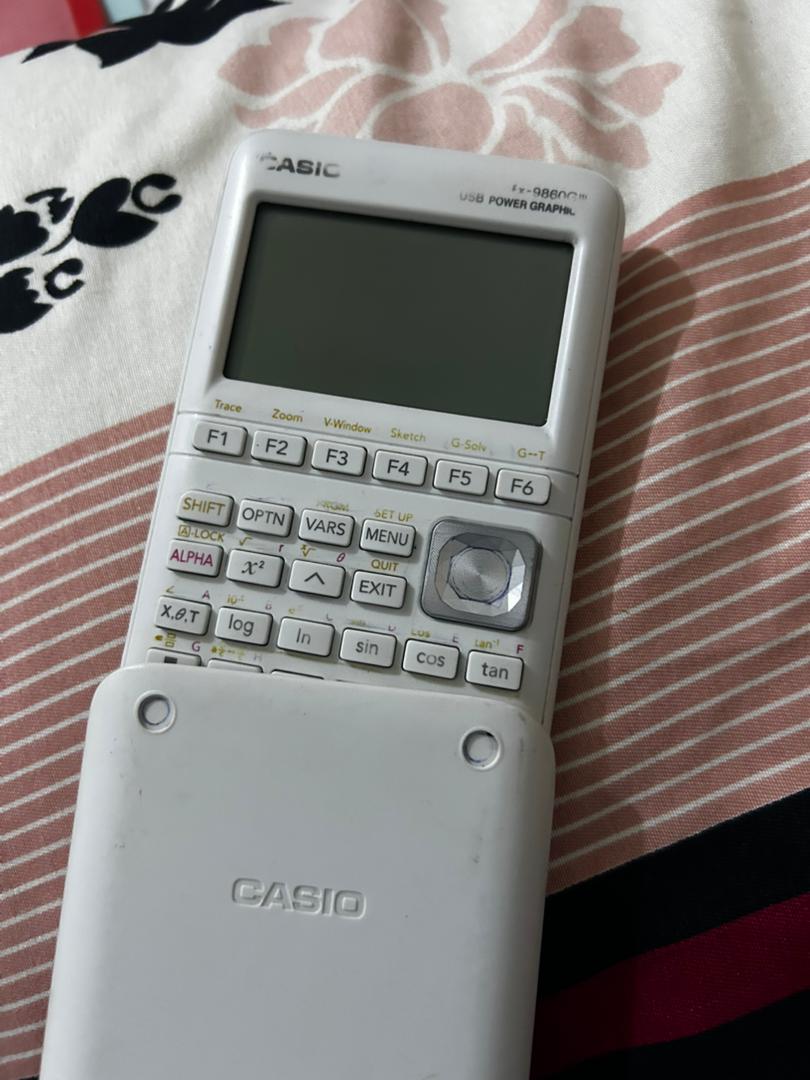 Calculatrice graphique blanche en excellent état