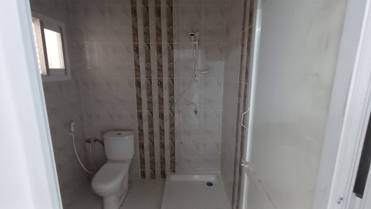 Local commercial 40 m² et appartement F3 à Gabode 2