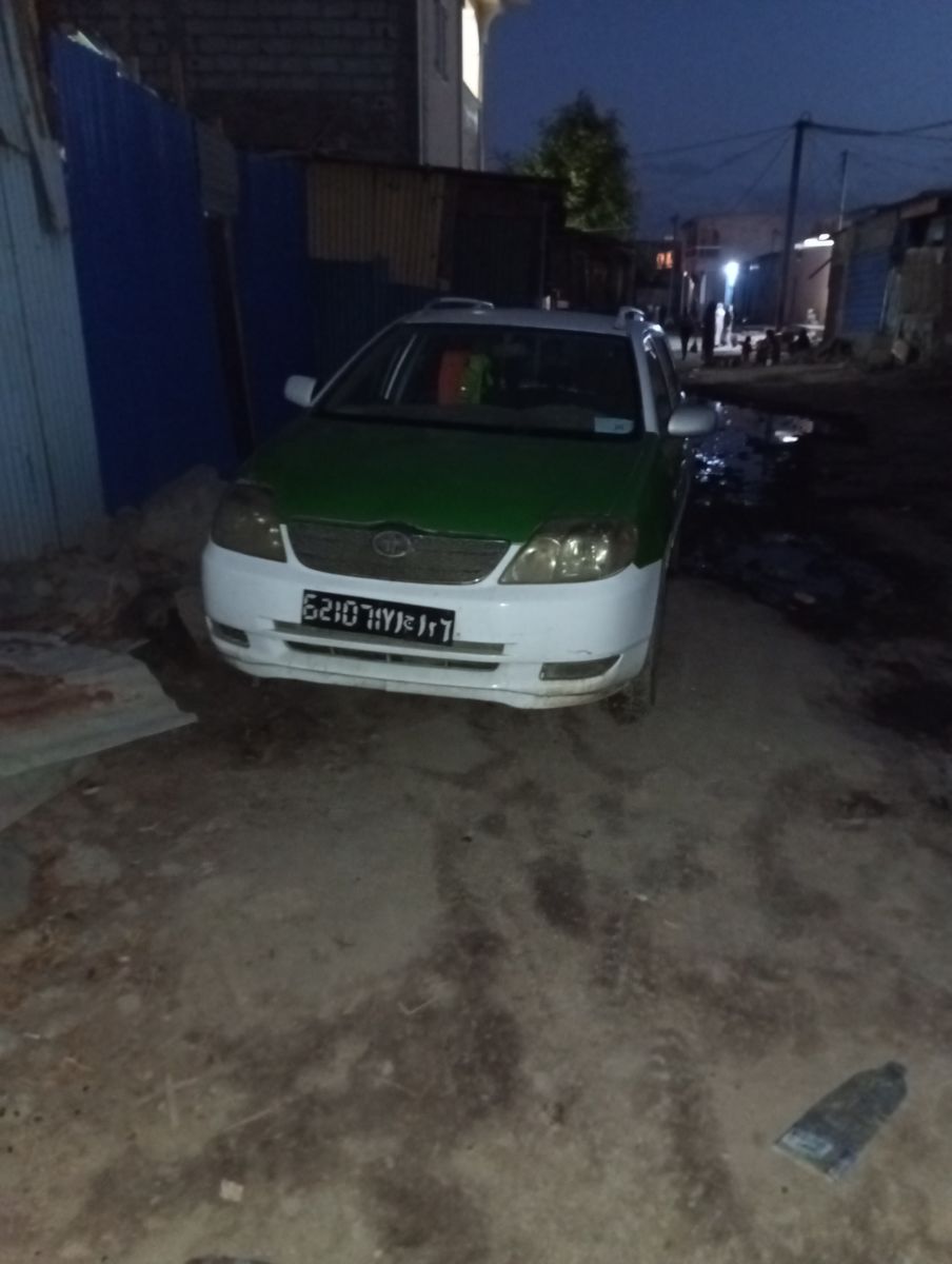 Taxi Toyota Corolla avec climatiseur en très bon état