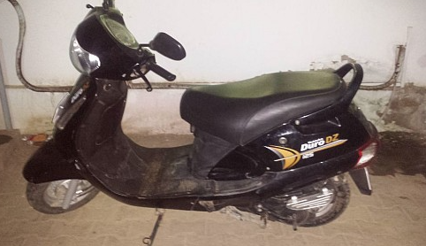 Scooter Duro noir 2 ans, moteur essence en bon état