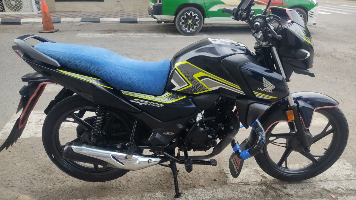 Honda SP125 125 cm3, comme neuve, économique et fiable