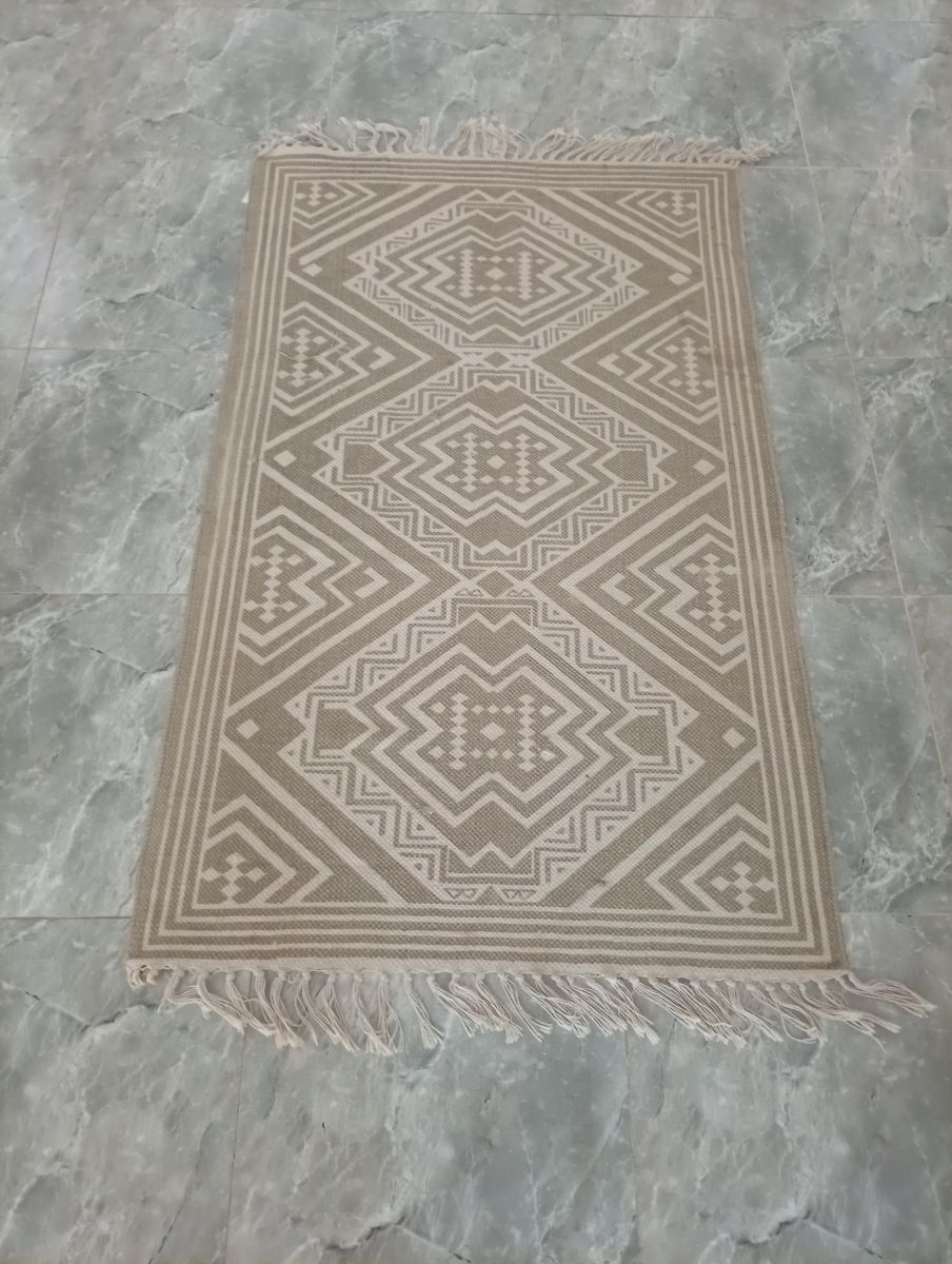 Tapis 139x79 cm en bon état