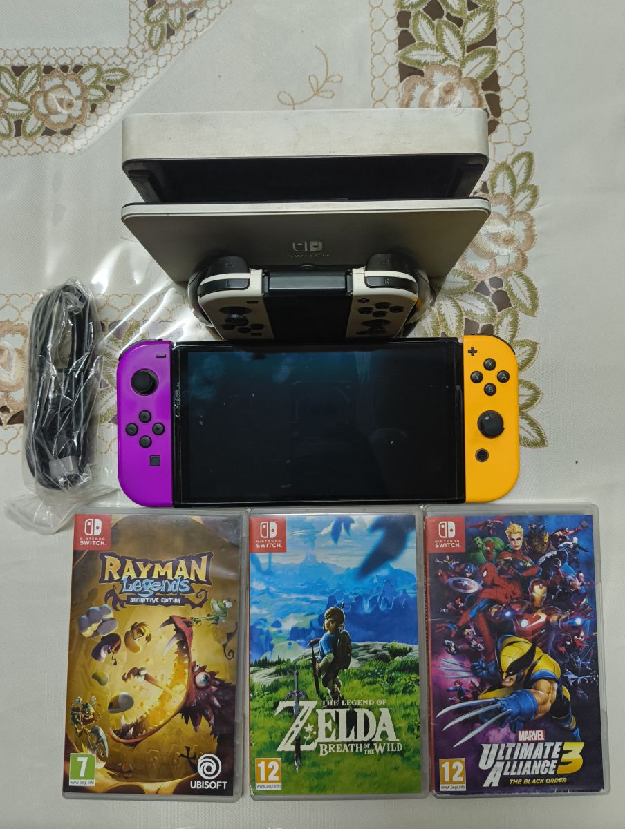 Nintendo Switch OLED avec 6 jeux et accessoires inclus