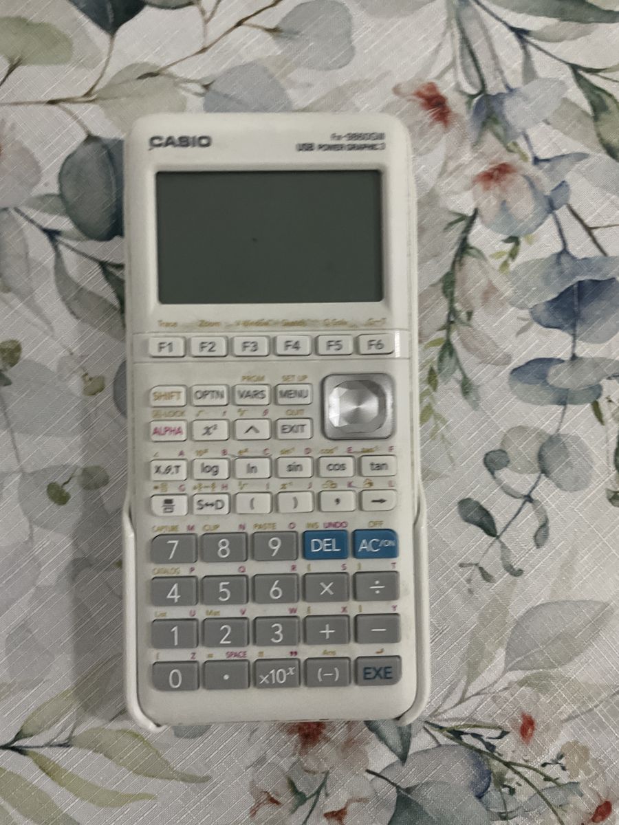 Calculatrice graphique avec programmes Terminale S en bon état
