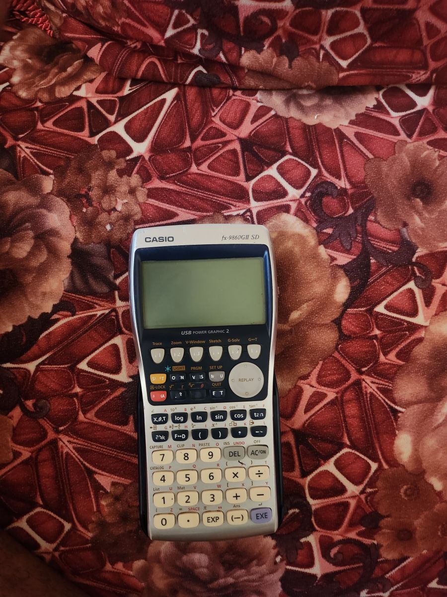 Calculatrice en très bon état pour examen
