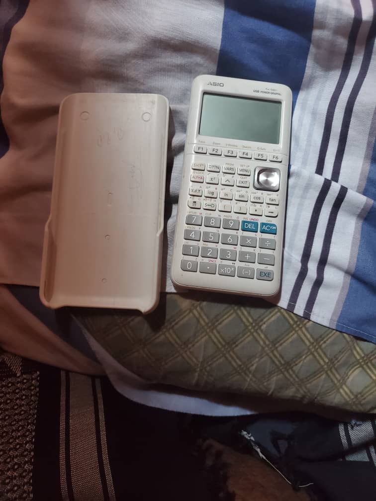 Calculatrice graphique de qualité en bon état récent