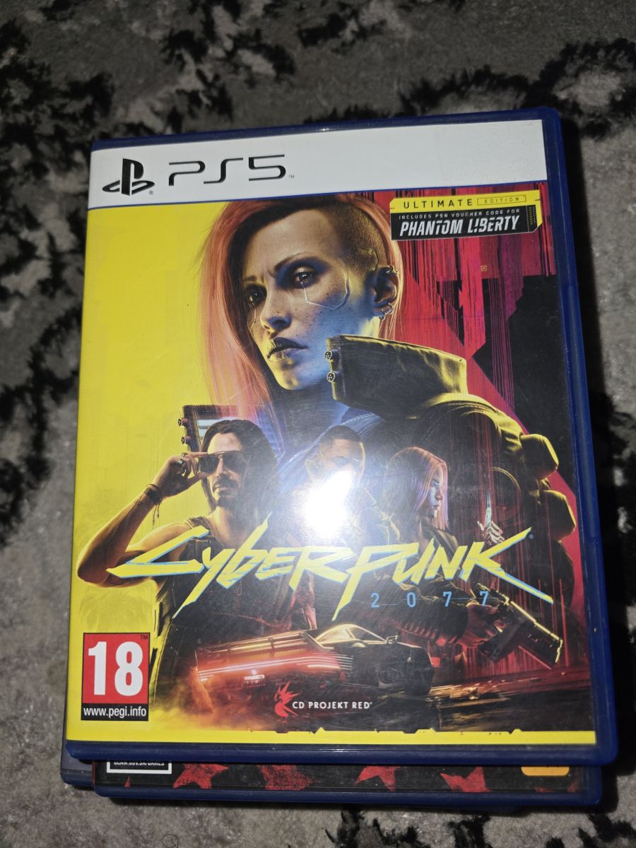 Jeu PS5 Cyberpunk avec DLC Phantom City en excellent état