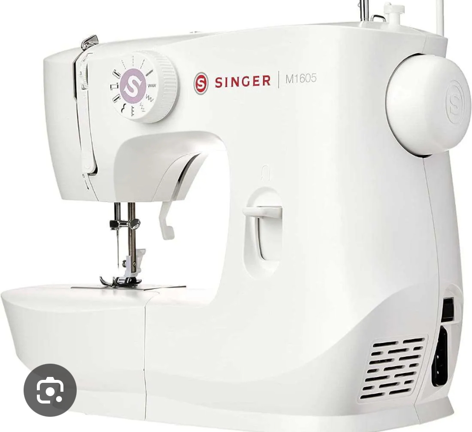 Machine à coudre électrique Singer en très bon état
